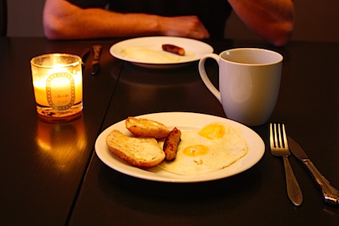 2 eggs, sourdough toast and 1 piece of chicken sausage