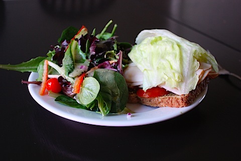 open-faced pesto turkey sandwich on Ezekiel